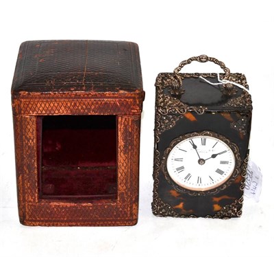 Lot 182 - A tortoiseshell striking carriage clock, circa 1890, scroll and pierced white metal mounts,...