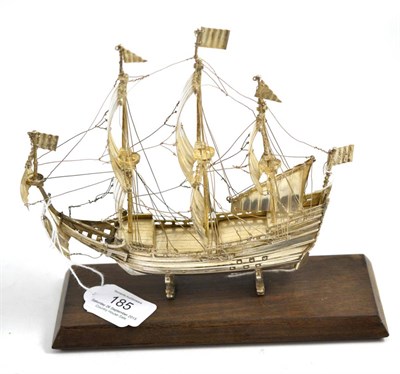 Lot 185 - Continental silver ship model on wood stand, 18cm high