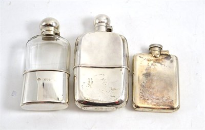 Lot 190 - A Victorian silver and cut glass hip flask, London 1891; another, Birmingham 1930, with a...