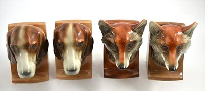 Lot 201 - A set of four pottery hunting bookends with Earl of Lonsdale provenance