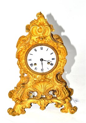 Lot 209 - An ormolu striking mantel clock, circa 1850, scroll decorated case with shell motifs, enamel...