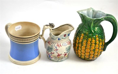 Lot 223 - Mochaware 2-pint ale mug, majolica pineapple jug and a Prattware jug John Gilpins Ride (3)