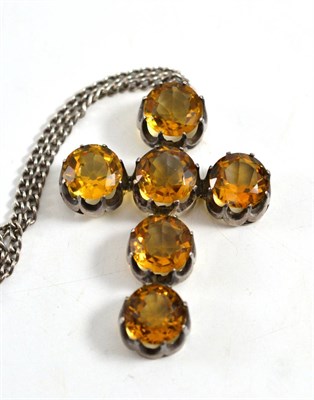 Lot 247 - A citrine cross, six round mixed cut citrines in white coronet claw settings, measures 4.5cm by...