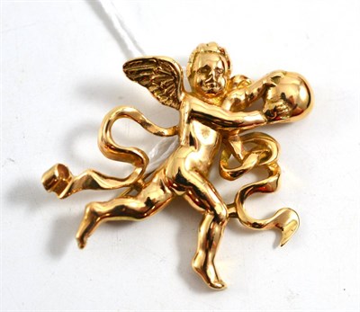 Lot 253 - A cherub brooch/pendant, the cherub holding a ball with ribbons around him, measures 4.4cm by 4cm