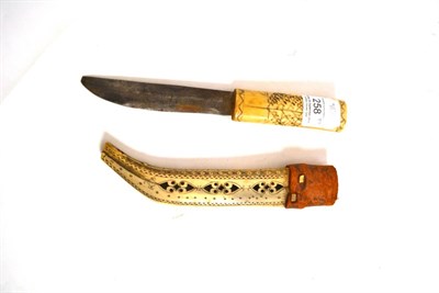 Lot 258 - Sami man's knife (Northern Sweden) ";Lapps"; Caribou antler, late 19th century, engraved with...