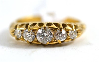 Lot 260 - A Victorian diamond five stone ring, the graduated old cut diamonds in a yellow claw setting, total