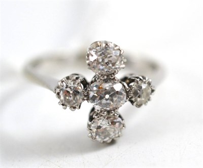 Lot 268 - A diamond five stone cluster ring, the old cut diamonds in white claw settings, to a tapered...