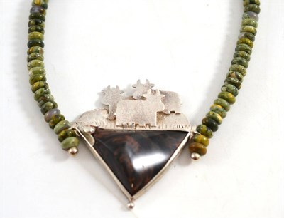 Lot 270 - A jasper necklace, green and brown beads with a central pendant in a brown and black colours...