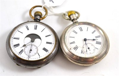 Lot 276 - A gun metal double dialled calendar moonphase pocket watch, circa 1900, 52mm wide, and another...