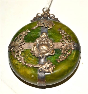 Lot 285 - Chinese white metal mounted jade pendant worked with Buddhas and insects, 7cm