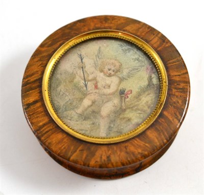 Lot 289 - An early 19th century burr walnut snuff box, lined in tortoiseshell, with watercolour portrait of a