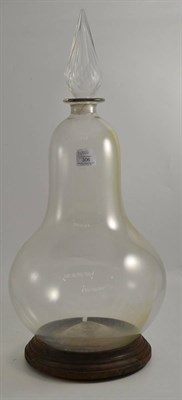 Lot 306 - A large Victorian glass carboy, with stopper and stand