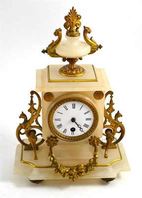 Lot 310 - Late 19th century French gilt metal and onyx striking mantel clock with white circular enamel dial