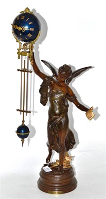 Lot 317 - A bronzed spelter mystery timepiece, early 20th century, winged figure holding a scroll and...