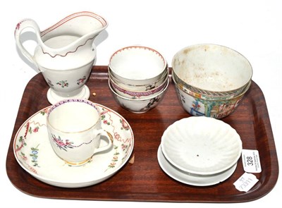 Lot 328 - A tray including four 18th century tea bowls, an 18th century Newhall cream jug, saucer dish...