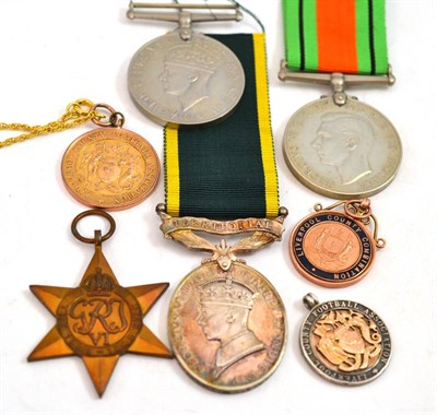 Lot 343 - Three 1939-1945 medals, Efficient Service Medal, two 9ct gold Liverpool County Football medals...