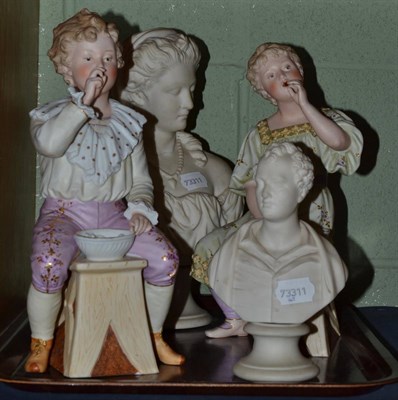 Lot 383 - A pair of late 19th century bisque figures modelled as a girl and boy blowing bubbles, each...