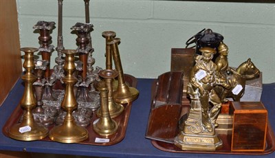 Lot 386 - Two trays including brass and silver plated candlesticks, two fireside ornaments, miner's lamp, two