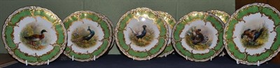 Lot 402 - A set of eight Dresden porcelain cabinet plates, circa 1900, painted with birds within green...