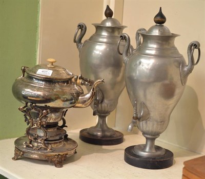 Lot 407 - A 19th century white metal spirit kettle on stand, another and a pair of pewter epergnes