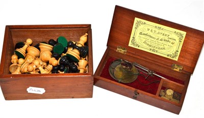 Lot 446 - A Staunton boxwood and ebonised chess set in a mahogany box; and a boxed set of Avery Scales