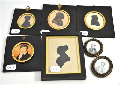 Lot 449 - Four framed silhouette profile portraits, an oval portrait of a young gentleman, and a pair of...