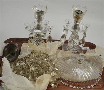 Lot 461 - Pair of cut glass table lustres, 19th century, hung with faceted drops, 23cm; and a cut glass light