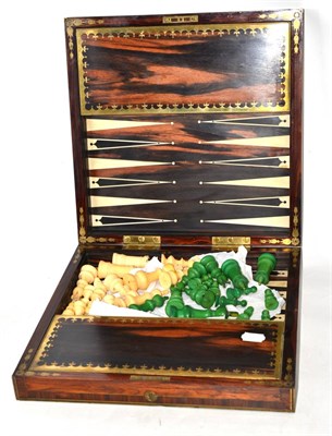 Lot 484 - A late 19th century Coromandel wooden games box draughts/chess with late 19th/early 20th...