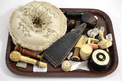 Lot 532 - A collection of sewing items and a bone teetom; a Georgian cream silk Christening pin cushion etc