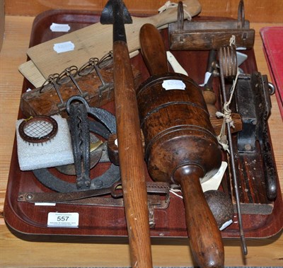 Lot 557 - A quantity of 19th century and later implements and traps including wallpaper trimmer; ballot...