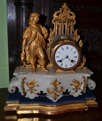 Lot 588 - A gilt metal and onyx striking mantel clock, circa 1900, figural case with gilt metal mounts,...