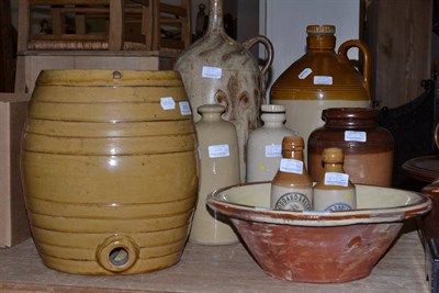 Lot 619 - * A stoneware water filter, a Victorian glazed basin, two hot-water bottles, stoneware bottles etc