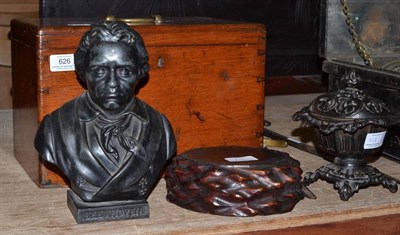 Lot 626 - Box of silver plated Kings Pattern flatware, case metal bust of Beethoven, cast iron vase and...