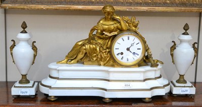 Lot 654 - A white marble and gilt metal striking mantel clock with garniture, retailed by Hry Marc A...