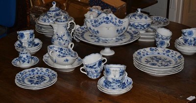 Lot 683 - A Meissen porcelain Onion pattern service, circa 1900, comprising: a sauce tureen and cover,...