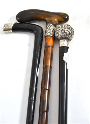 Lot 689 - A horn handled walking cane with silver ferrule, Victorian walking cane engraved Rexham and an...