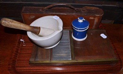 Lot 706 - * A Victorian brass pill board, a pestle and mortar, a chemist's storage jar and cover, an...