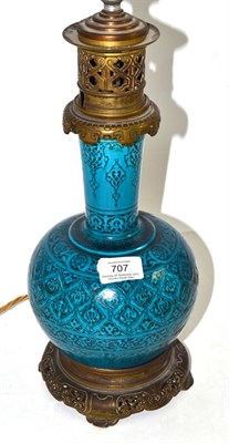 Lot 707 - Late 19th century French turquoise pottery bottle vase with metal mounts, as a lamp