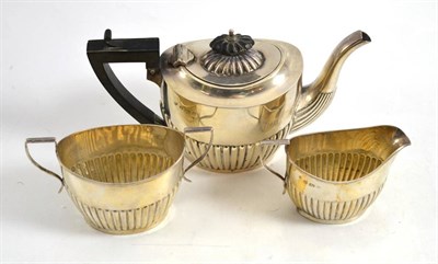 Lot 713 - A silver three piece bachelors tea service, Birmingham assay