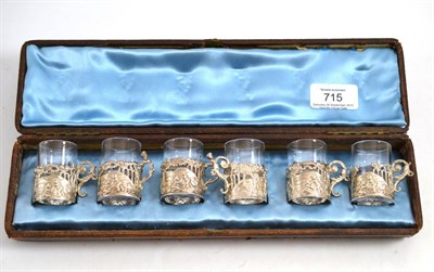 Lot 715 - A boxed set of silver glasses by William Comis in a fitted leather case