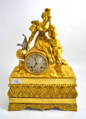 Lot 726 - A gilt metal striking mantel clock, circa 1880, surmounted by a seated lady in costume,...