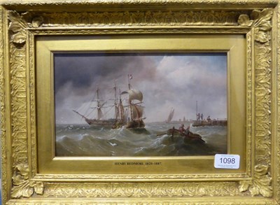 Lot 1098 - Attributed to Edward King Redmore (1860-1941) Shipping in choppy seas off a pier, oil on board,...