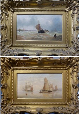 Lot 1135 - Edward King Redmore (1860-1941) Boats moored on a calm sea, signed, oil on canvas, together...