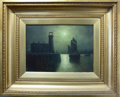 Lot 1137 - Walter Linsley Meegan (1859-1944) Scarborough lighthouse at moonlight, signed, oil on canvas,...