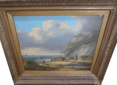 Lot 1171 - Follower of George Morland (1796-1804), Fisher folk and a beached boat in a rocky cove, bares...