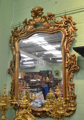 Lot 1253 - Reproduction gilt Rococo style mirror, 140cm high