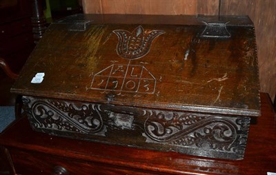 Lot 1273 - An 18th century carved oak table box, carved with initials 'A L' and dated 1703