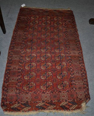 Lot 1289 - Tekke rug, Emirate of Bukhara, the rose madder field of quartered guls enclosed by sunburst...