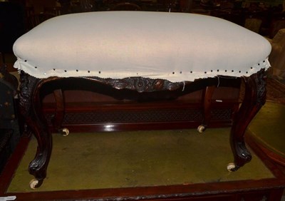 Lot 1296 - A Victorian carved walnut dressing stool