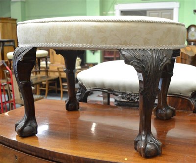 Lot 1305 - A Victorian oval dressing stool on claw and ball feet